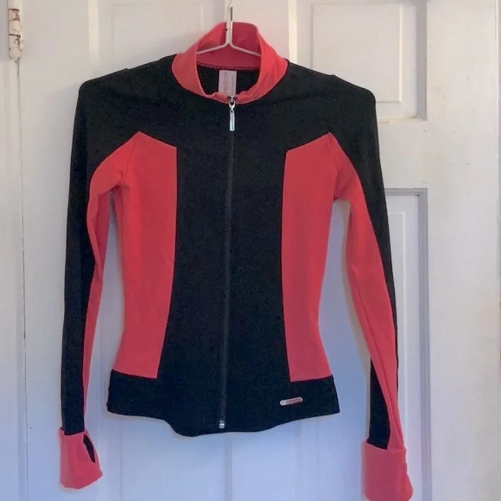 Mondor girls black and coral skating jacket in size 12 - 14